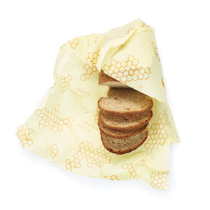 Bread wrapped in honeycomb bees wrap an eco-friendly zero waste product that replaces plastic wrap and ziplock bags