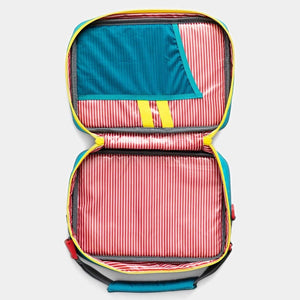 Inside of carry bag, teal blue pocket, red and white striped, yellow accents planet box rover and launch compatible