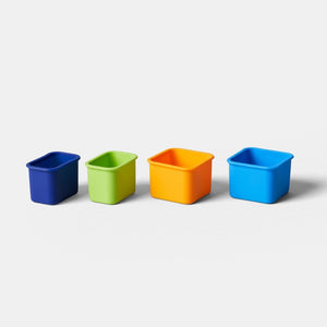 4 silicone snack pods that are meant to be used with planet box stainless steel lunchboxes jungle blue, lime green, goldenrod, ocean blue