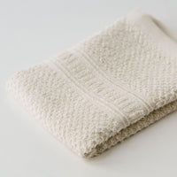 Close up Anact hemp-based wash cloth towel. 55% hemp 45% organic cotton. 12" x 12" Quick drying, Ultra absorbent