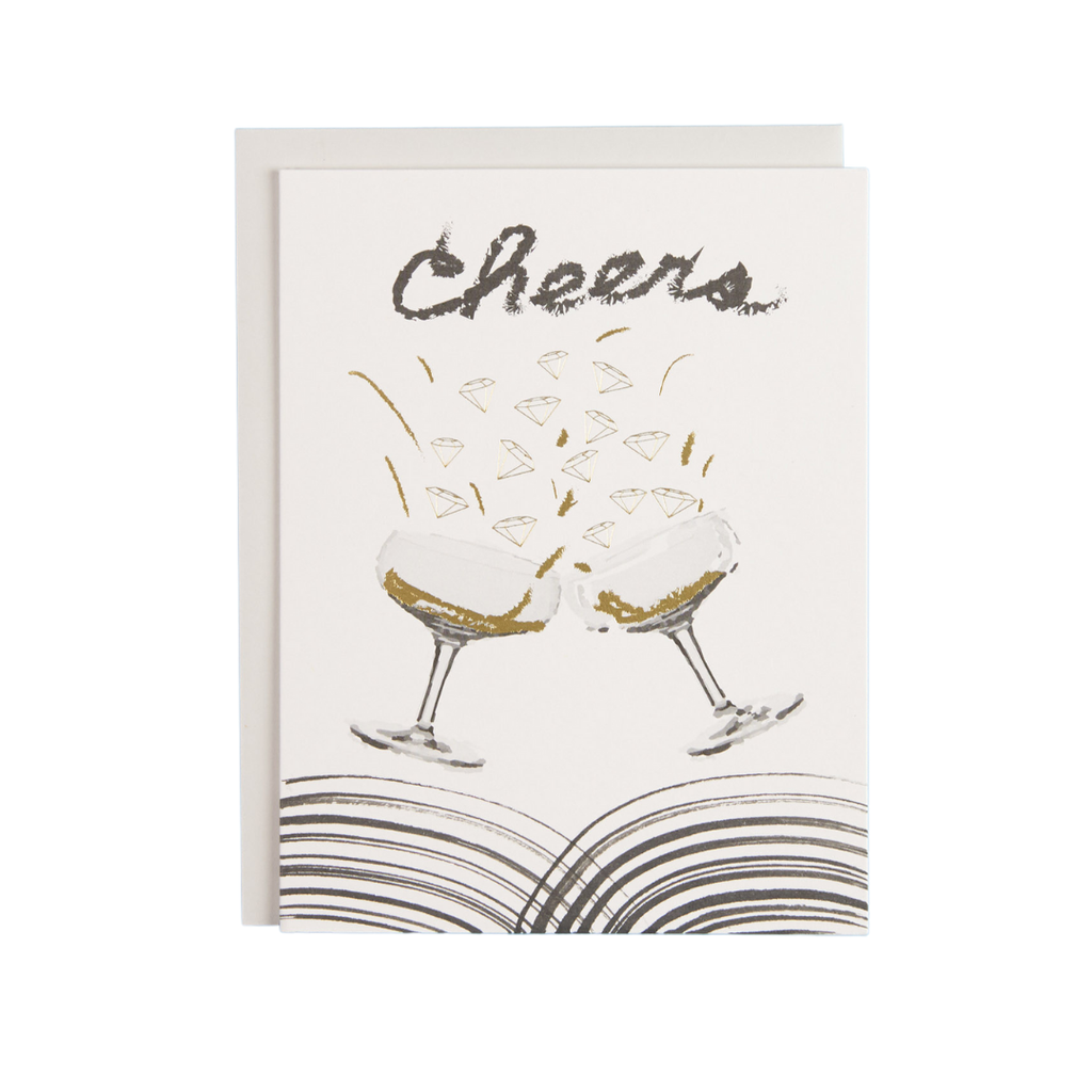 Cheers greeting card with two champagne glasses toasting the bridal couple on their wedding. greeting card blank inside. white silver envelope