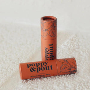 Blood Orange Mint Poppy & Pout Lip Balm in Dark Orange zero-waste packaging. Reap & Sow Zero Waste DIY Refillery